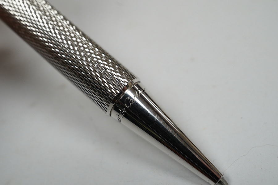 A Cartier pen, 14cm long, boxed. Condition - good